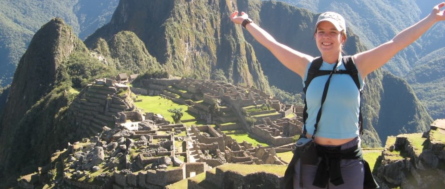 Posing in front of the Machu Picchu ruins