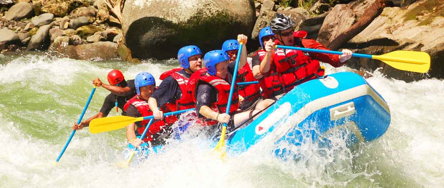 Kayaking Down Rapids