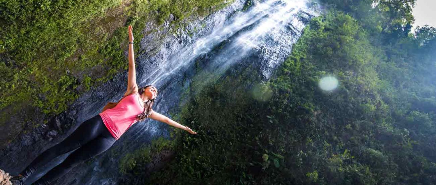 Standing under Nicaragua waterfall